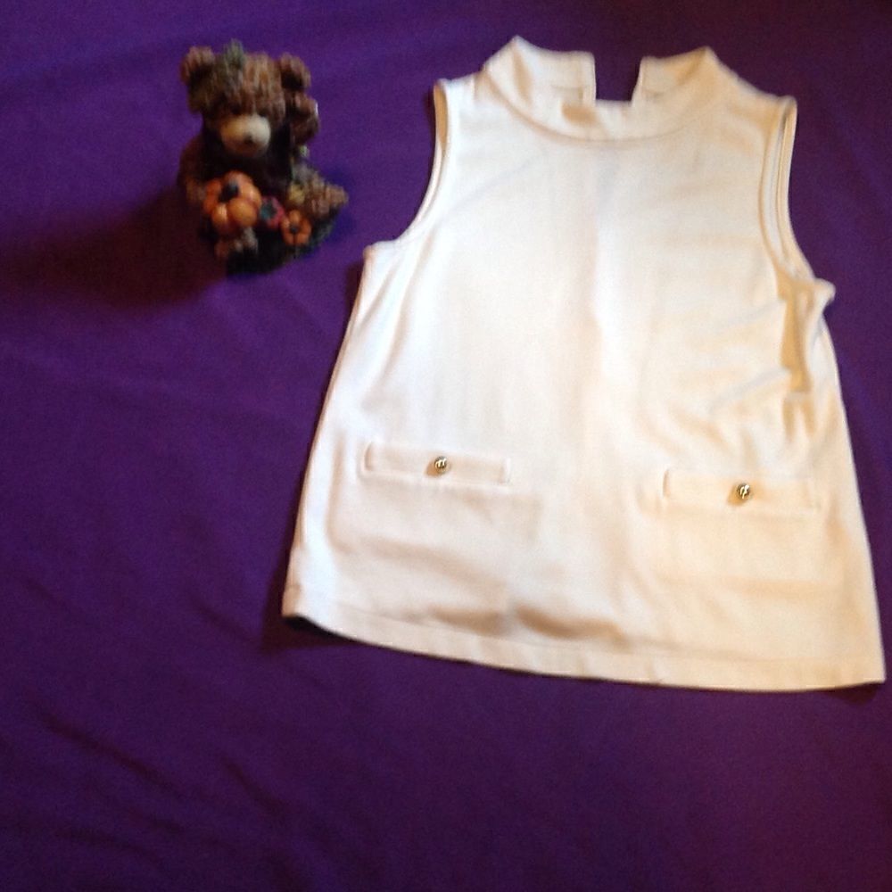 Sleeveless cream tank in ladies size medium